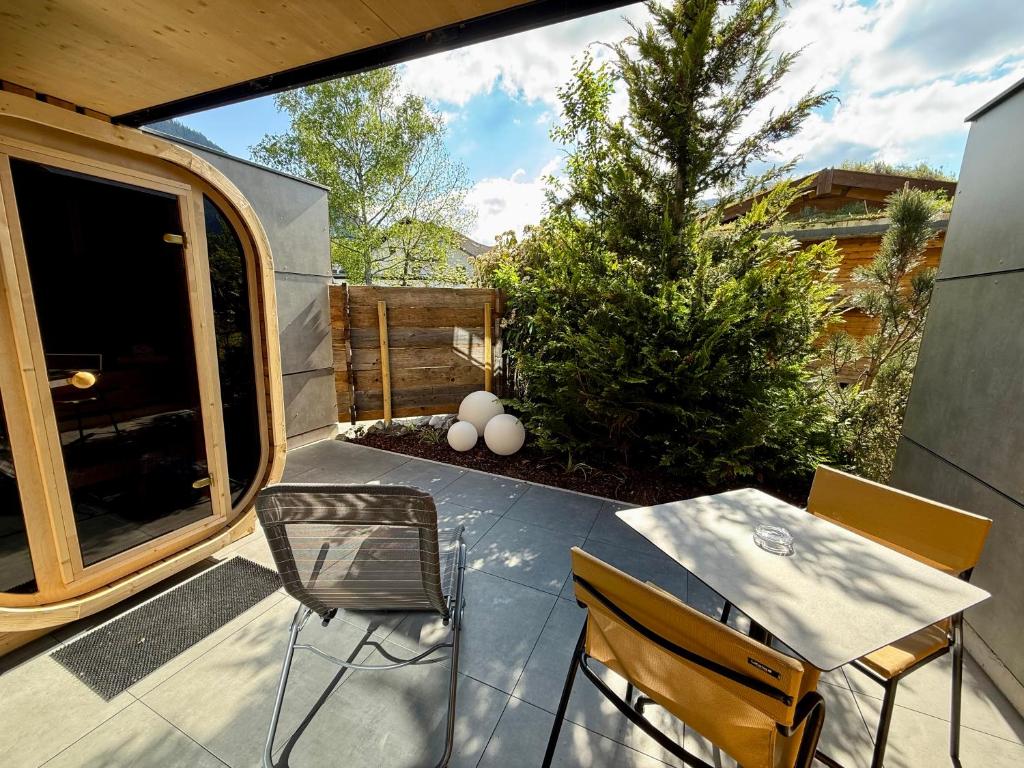 Balkón nebo terasa v ubytování TinyHome Singer - inclusive private Sauna