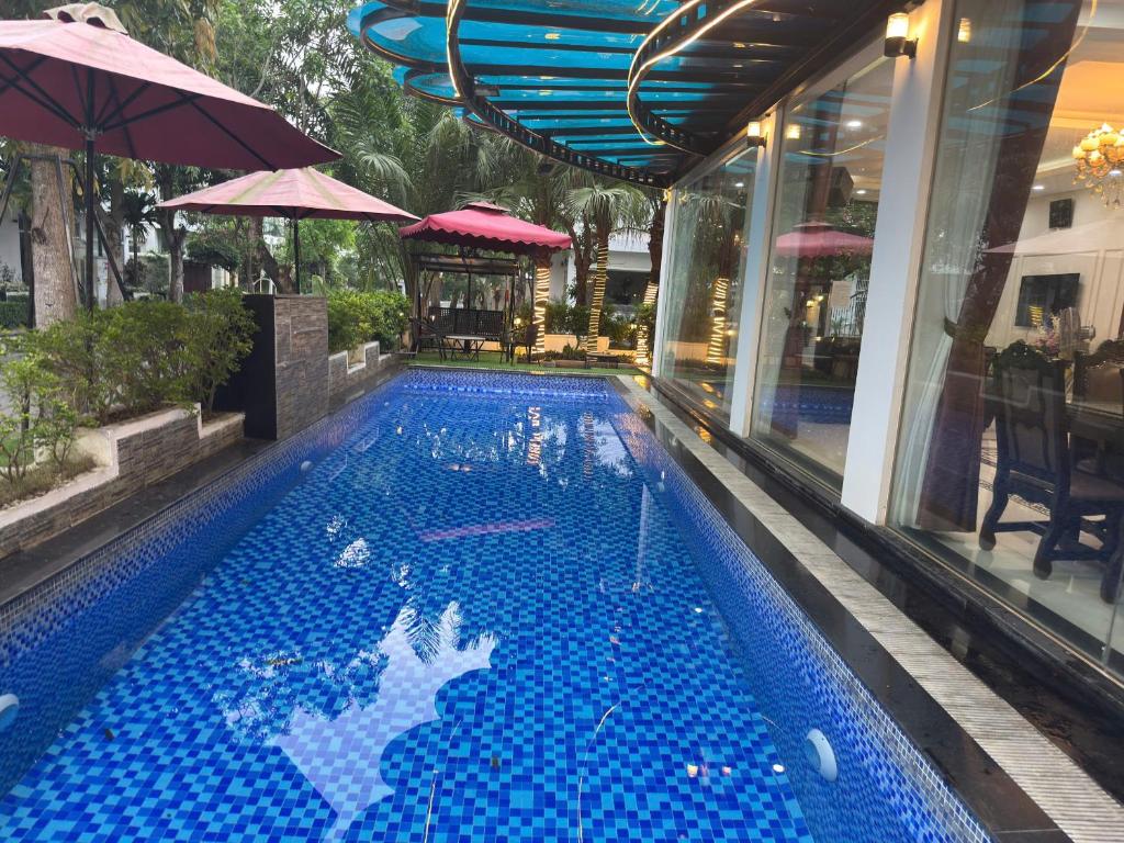 Swimmingpoolen hos eller tæt på Ngọc Trai 76 FLC Sầm Sơn