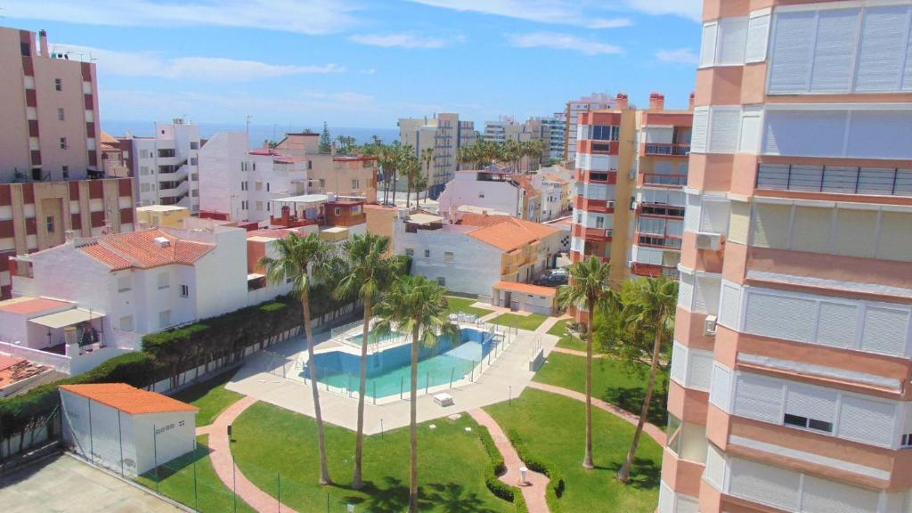 an aerial view of a city with buildings at Terrasol Estudios Plazamar in Torre del Mar