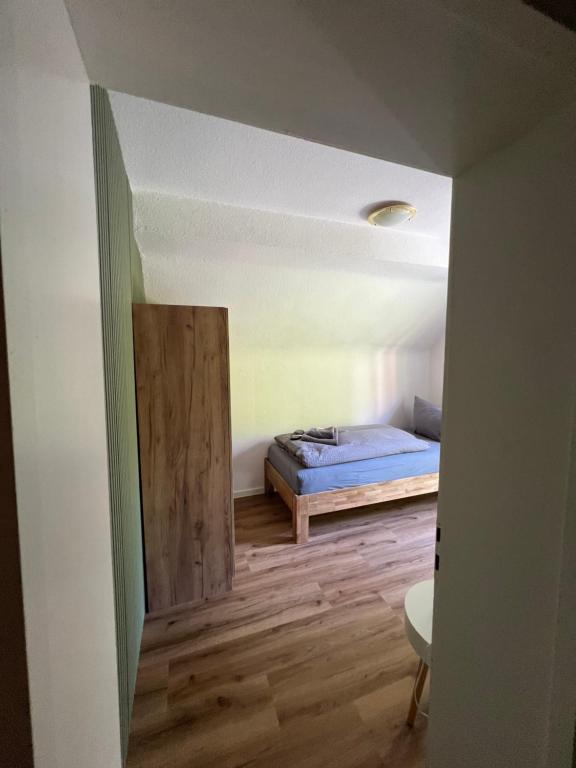 Postel nebo postele na pokoji v ubytování Pension Villa Pangea
