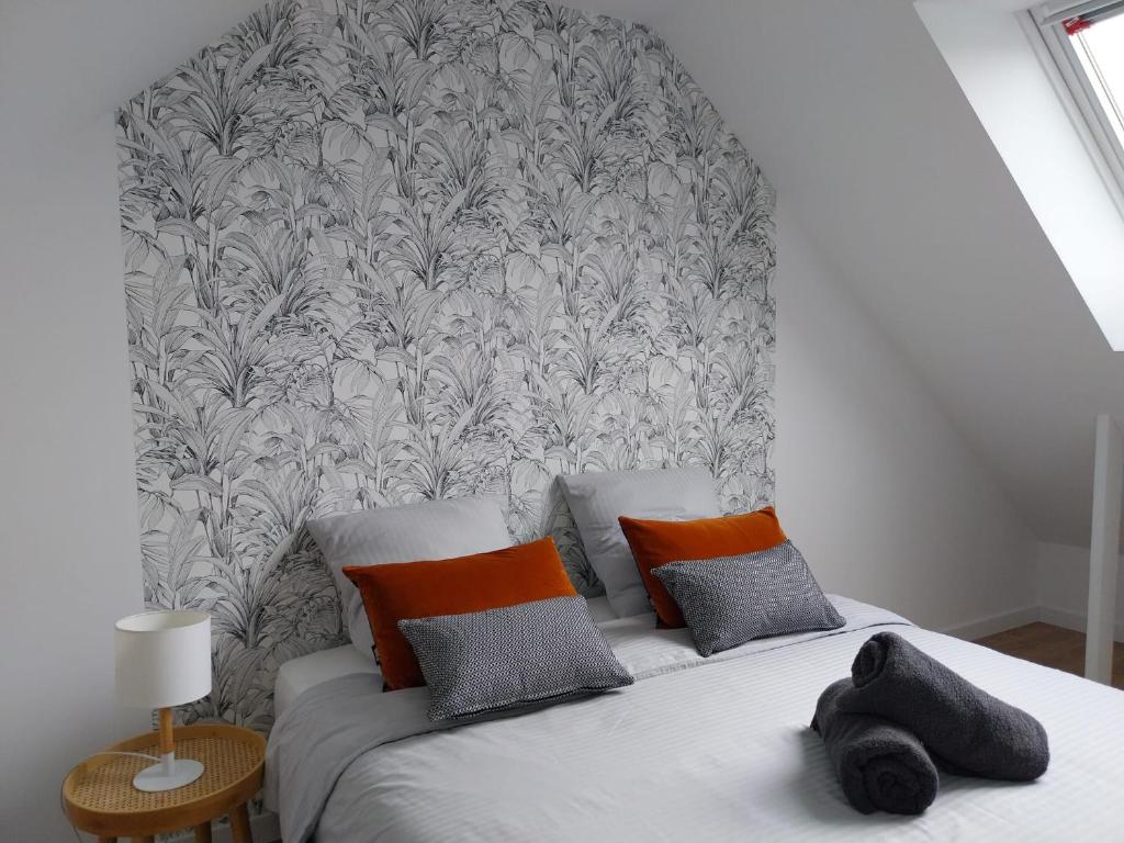 Ένα ή περισσότερα κρεβάτια σε δωμάτιο στο Disneyland Paris dream 2 rooms & breakfast