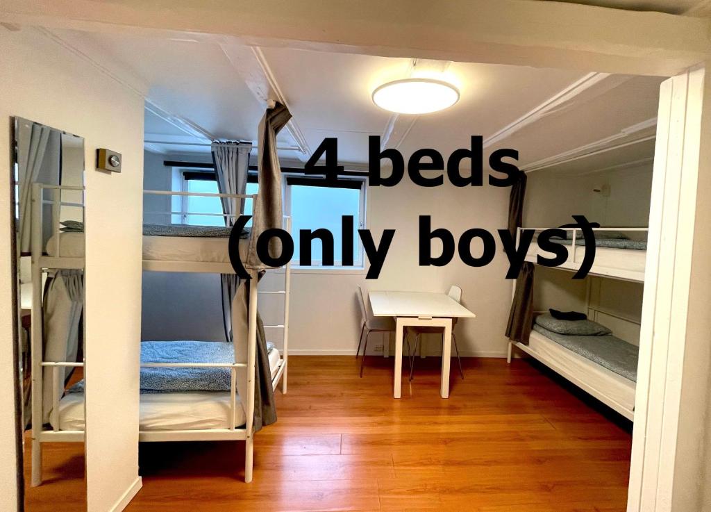 Postel nebo postele na pokoji v ubytování Central Stavanger Guesthouse