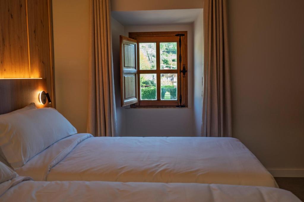 Cama o camas de una habitación en Hotel Valle del Ambroz