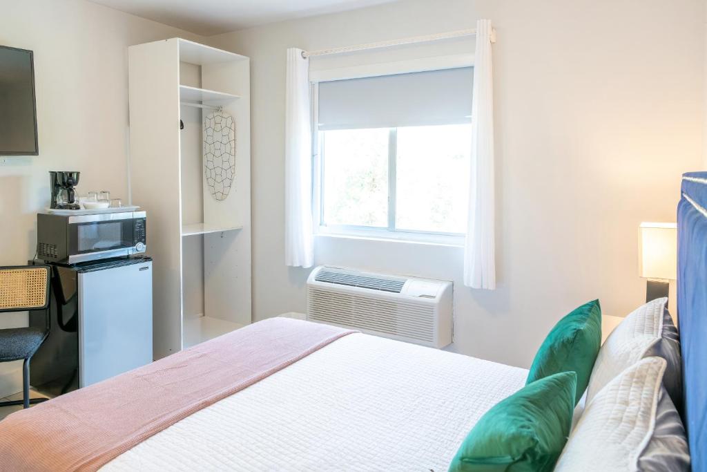 Postel nebo postele na pokoji v ubytování Costa Norte Boutique Hotel