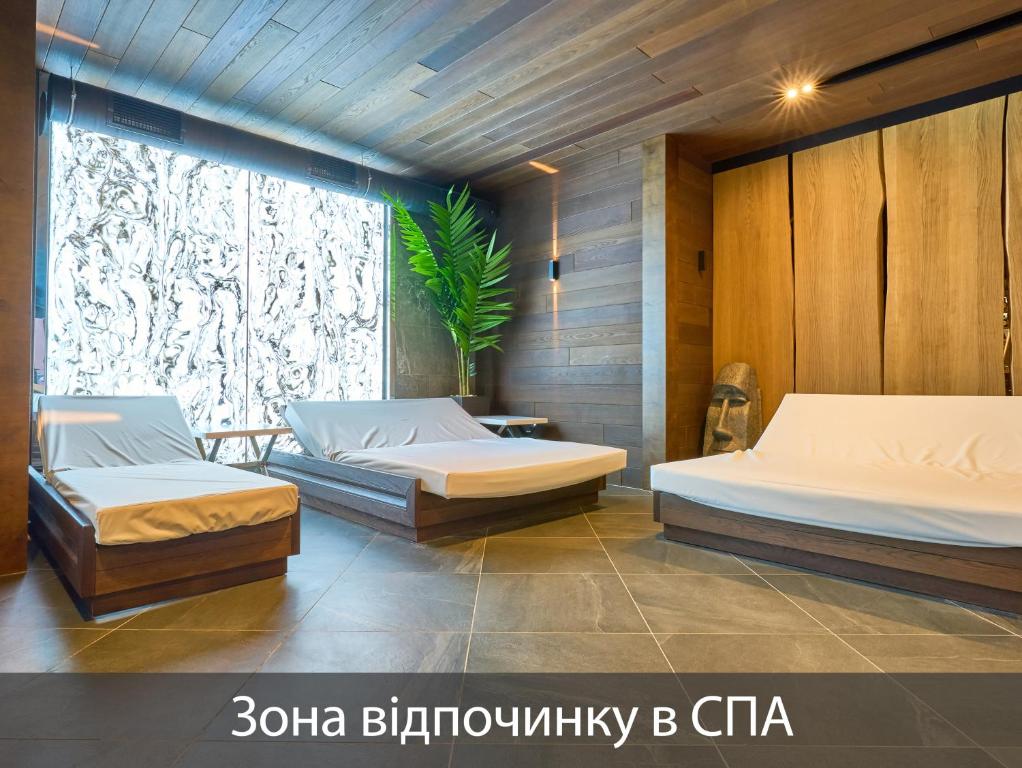 Postel nebo postele na pokoji v ubytování Twins Hotel & Spa