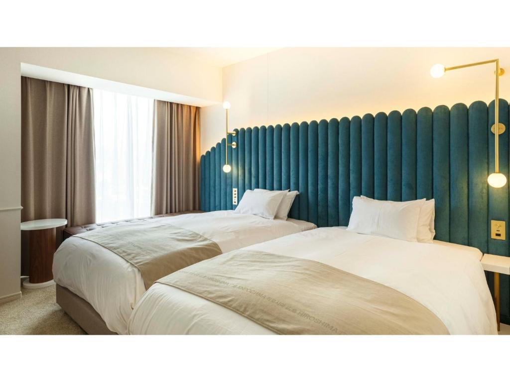 Katil atau katil-katil dalam bilik di THE KNOT HIROSHIMA - Vacation STAY 20541v