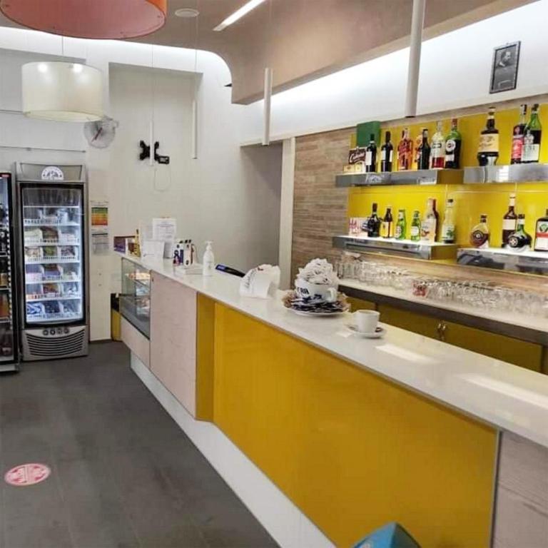 Kuchyň nebo kuchyňský kout v ubytování HOTEL HOUSE GARGANO