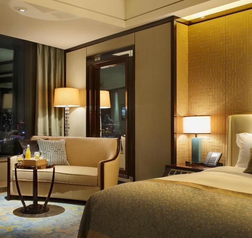 Postel nebo postele na pokoji v ubytování Kempinski Hotel Xiamen