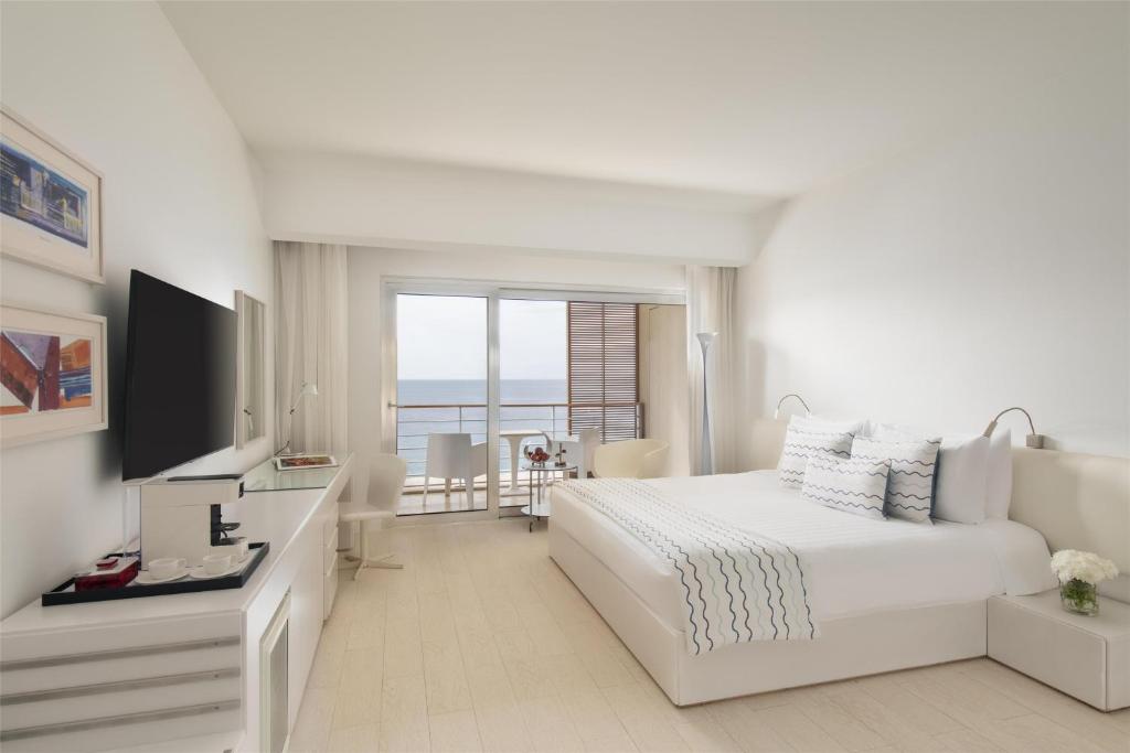 Postel nebo postele na pokoji v ubytování Kempinski Hotel Aqaba