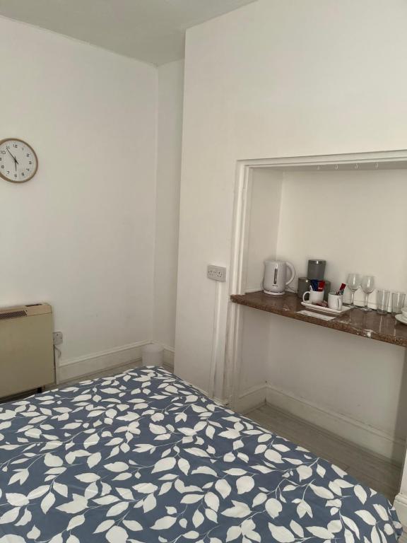 En eller flere senge i et værelse på Santel