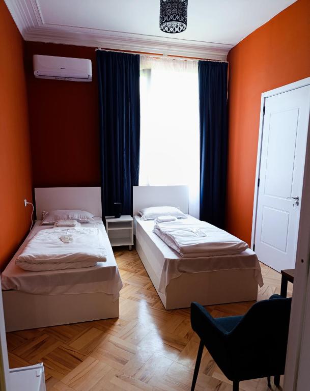 Postel nebo postele na pokoji v ubytování Guest House Top Floor