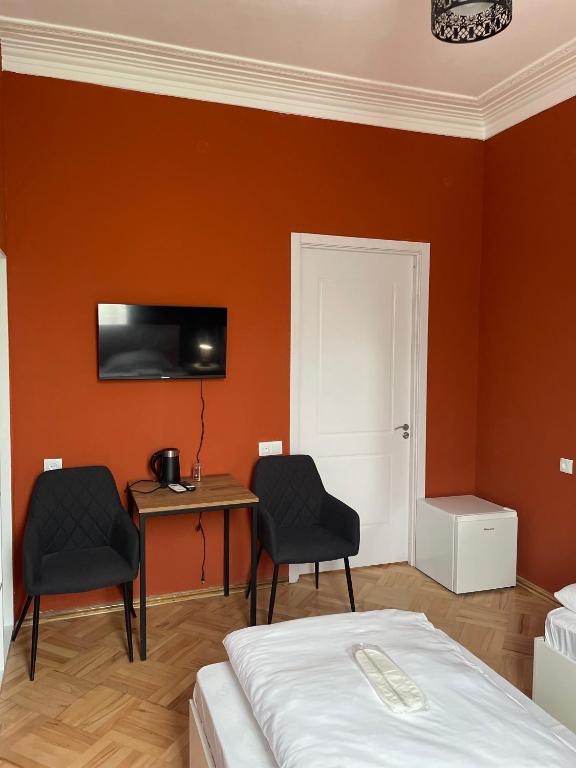 TV a/nebo společenská místnost v ubytování Guest House Top Floor