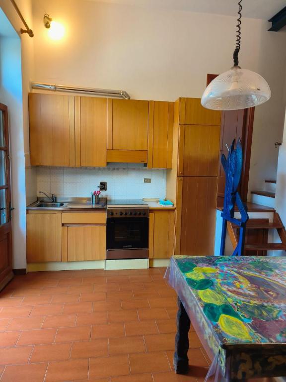 A kitchen or kitchenette at Camere Toni