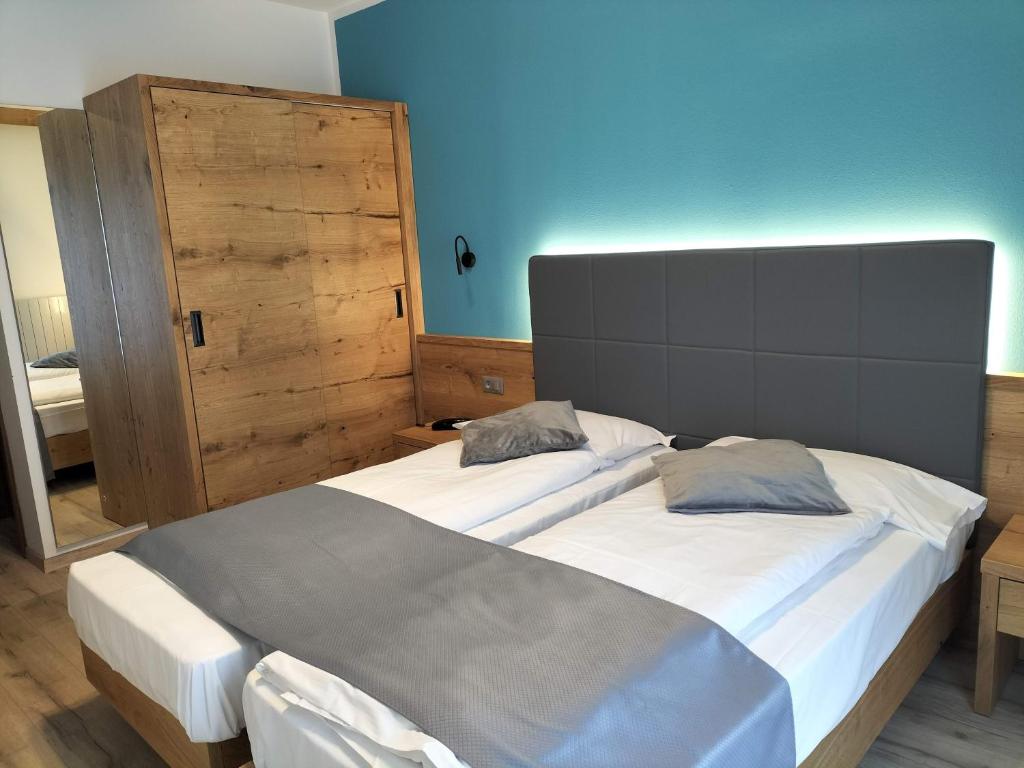 Postel nebo postele na pokoji v ubytování Hotel Angelo