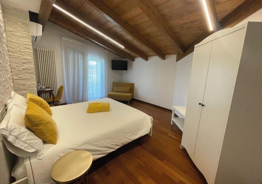 Postel nebo postele na pokoji v ubytování B&B DA NONNA ANACLE