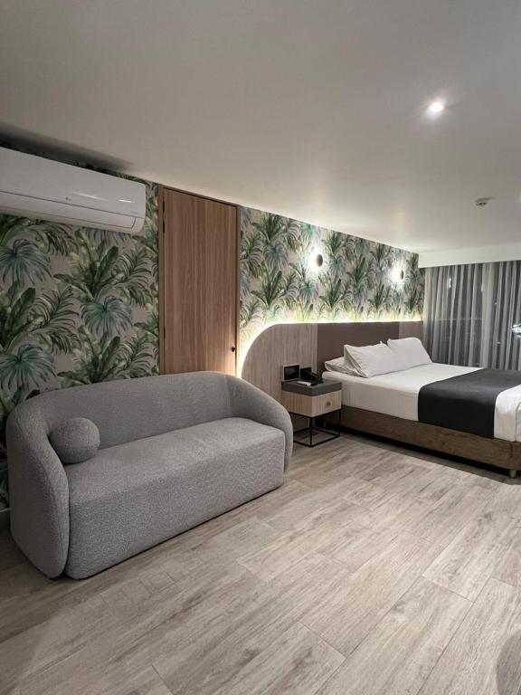 Postel nebo postele na pokoji v ubytování Zi One Luxury Hotel