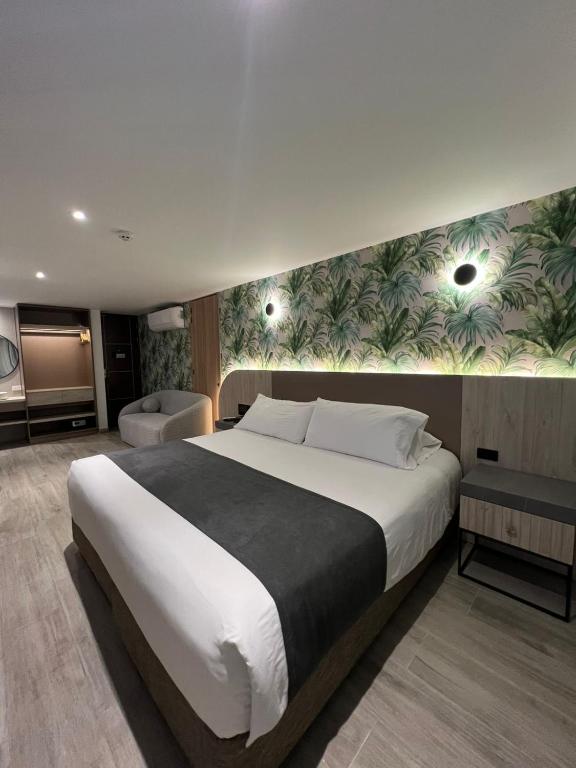 Postel nebo postele na pokoji v ubytování Zi One Luxury Hotel