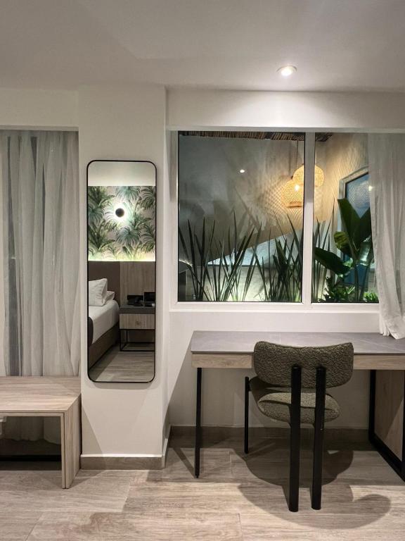 Postel nebo postele na pokoji v ubytování Zi One Luxury Hotel