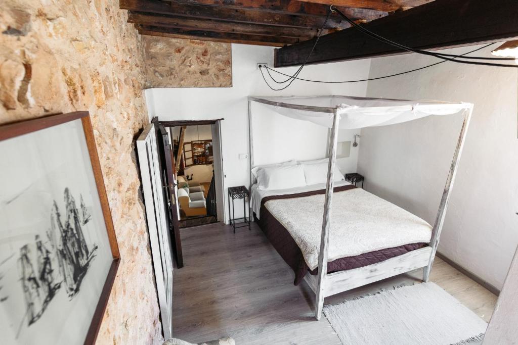 Postel nebo postele na pokoji v ubytování Hotel Rural Can Partit Adults Only-Ibiza