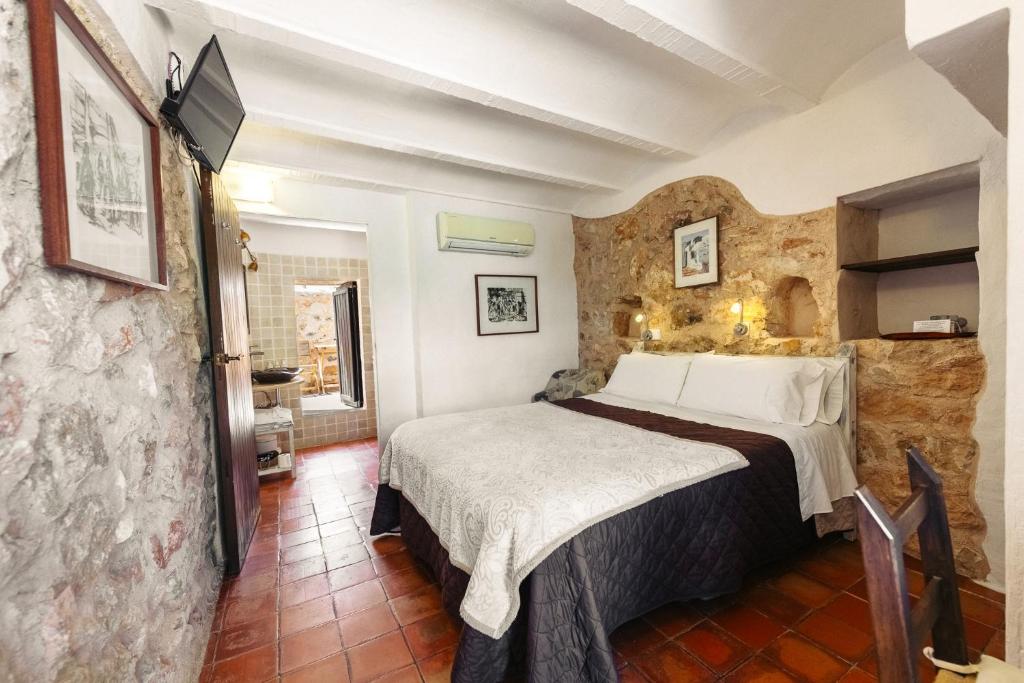 Postel nebo postele na pokoji v ubytování Hotel Rural Can Partit Adults Only-Ibiza