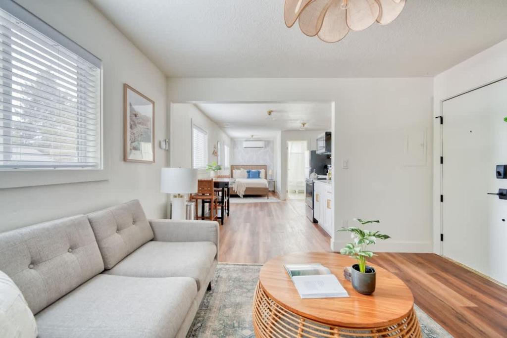 a living room with a couch and a table at Stay Portland - Amazing Giant Studio in Brooklyn in Portland
