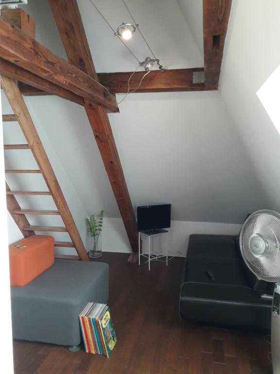 Χώρος καθιστικού στο Chambres chez Jean Luc