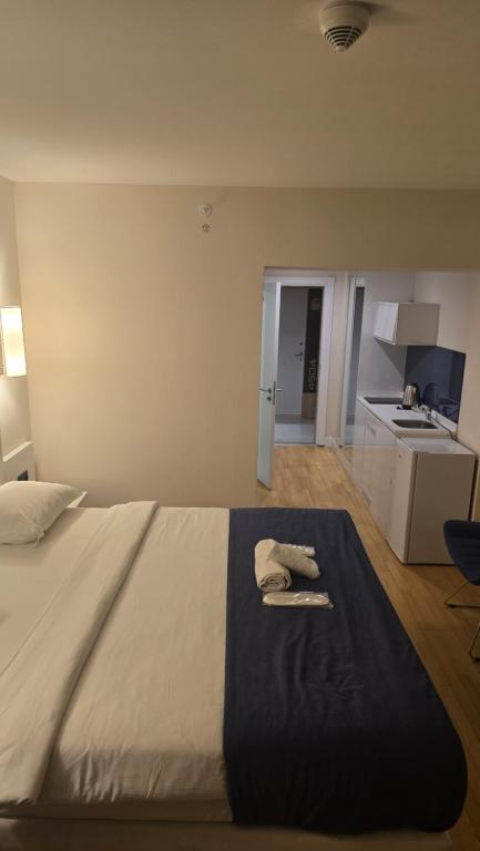 Postel nebo postele na pokoji v ubytování Orbi City Sea View Aparthotel