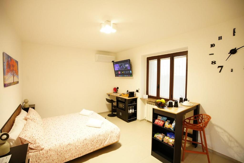 Postel nebo postele na pokoji v ubytování The One Malpensa Rooms