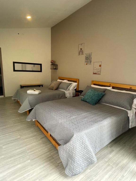 Postel nebo postele na pokoji v ubytování Santa Elena Lake House