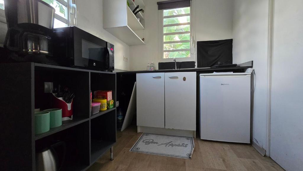 Kuchyň nebo kuchyňský kout v ubytování Hébergement Chez l'Habitant - Idéal pour Visiter la Martinique