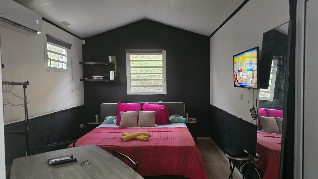 Postel nebo postele na pokoji v ubytování Hébergement Chez l'Habitant - Idéal pour Visiter la Martinique