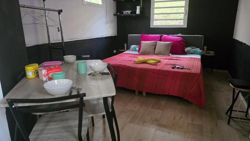Postel nebo postele na pokoji v ubytování Hébergement Chez l'Habitant - Idéal pour Visiter la Martinique