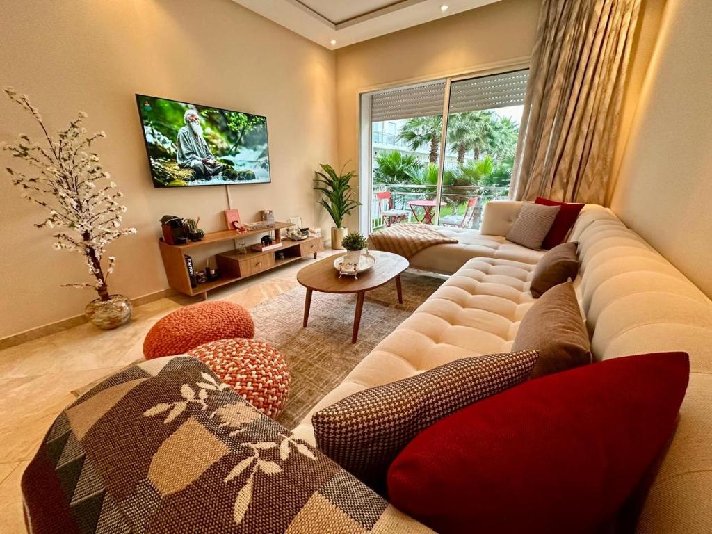 Istumisnurk majutusasutuses Cosy and stylish Condo in Bouznika