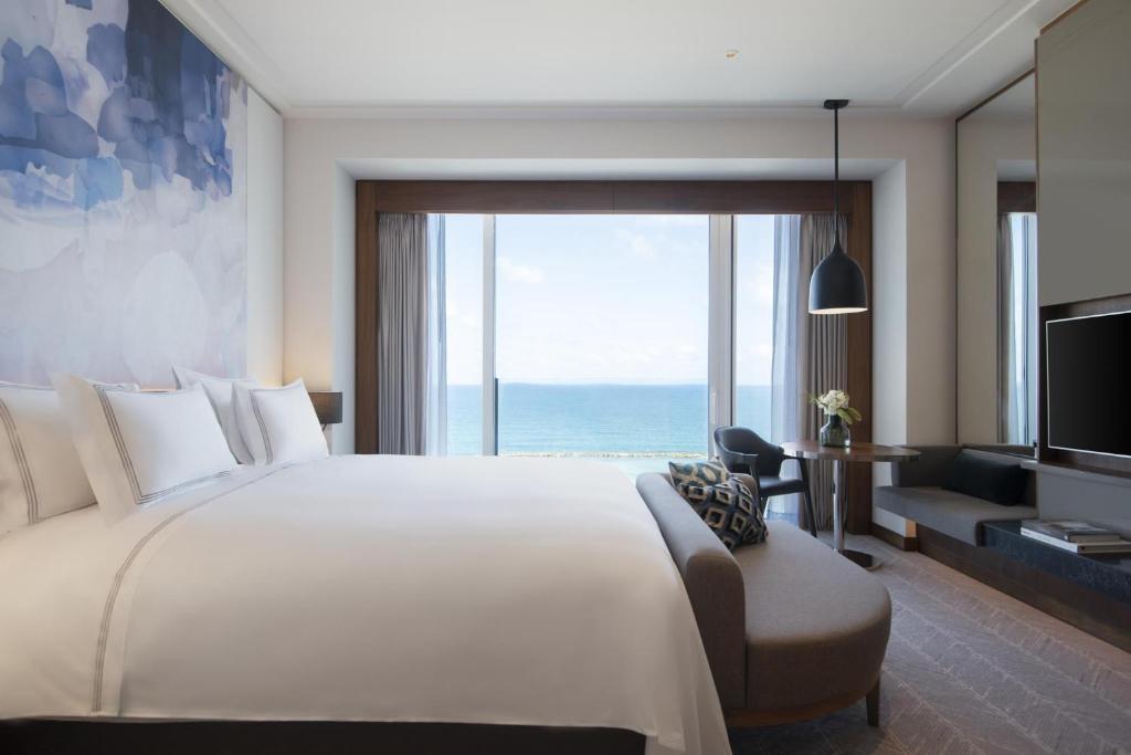 Postel nebo postele na pokoji v ubytování The David Kempinski Tel Aviv