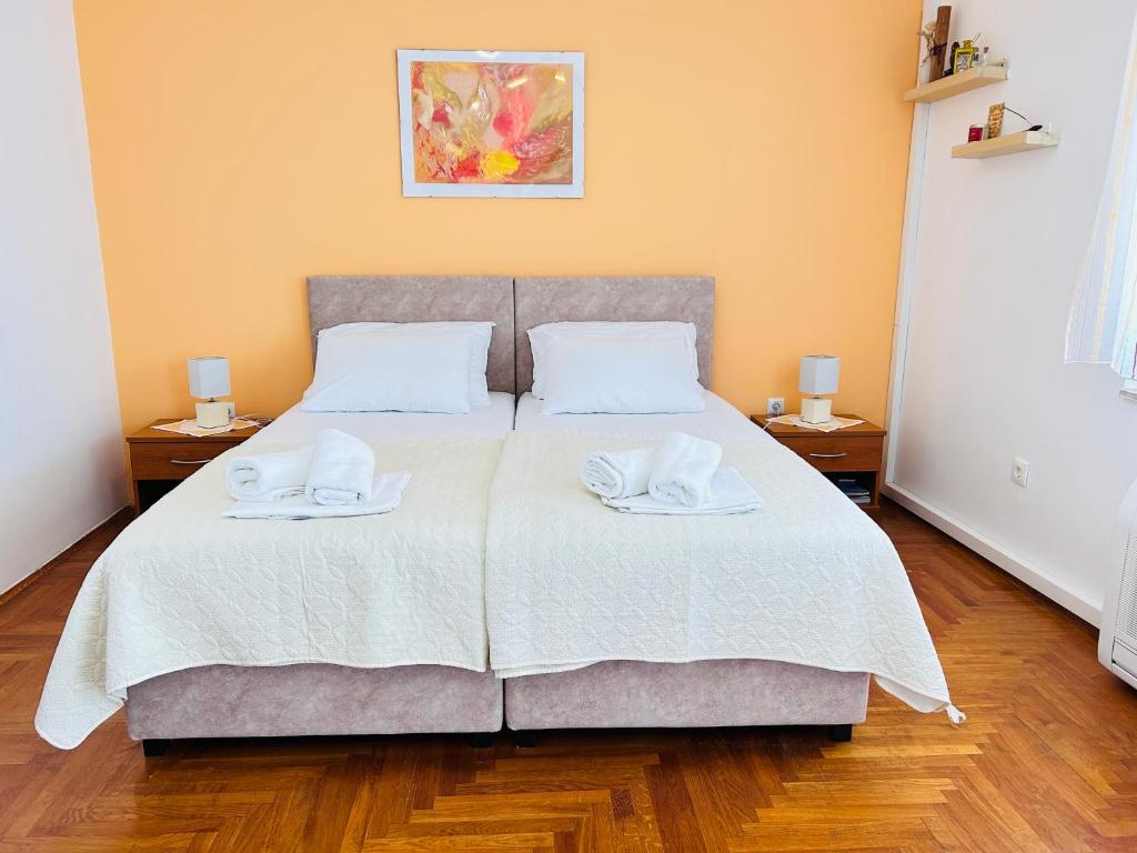 Postel nebo postele na pokoji v ubytování SeaView Guesthouse - ZF Hvar