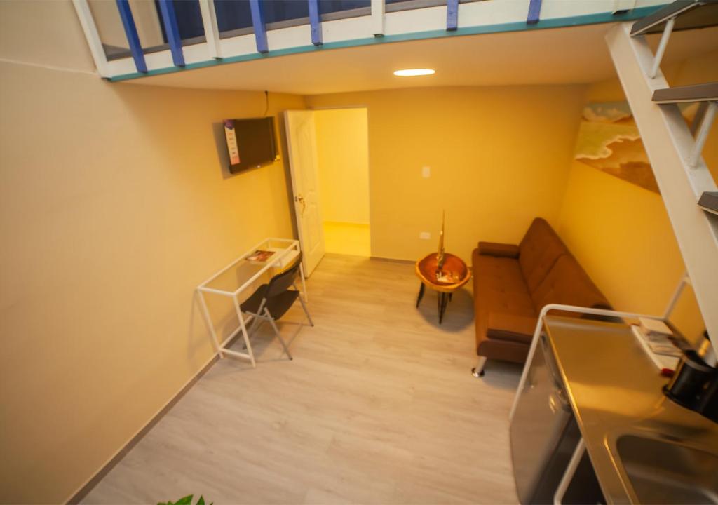 TV a/nebo společenská místnost v ubytování Jeymar Studio