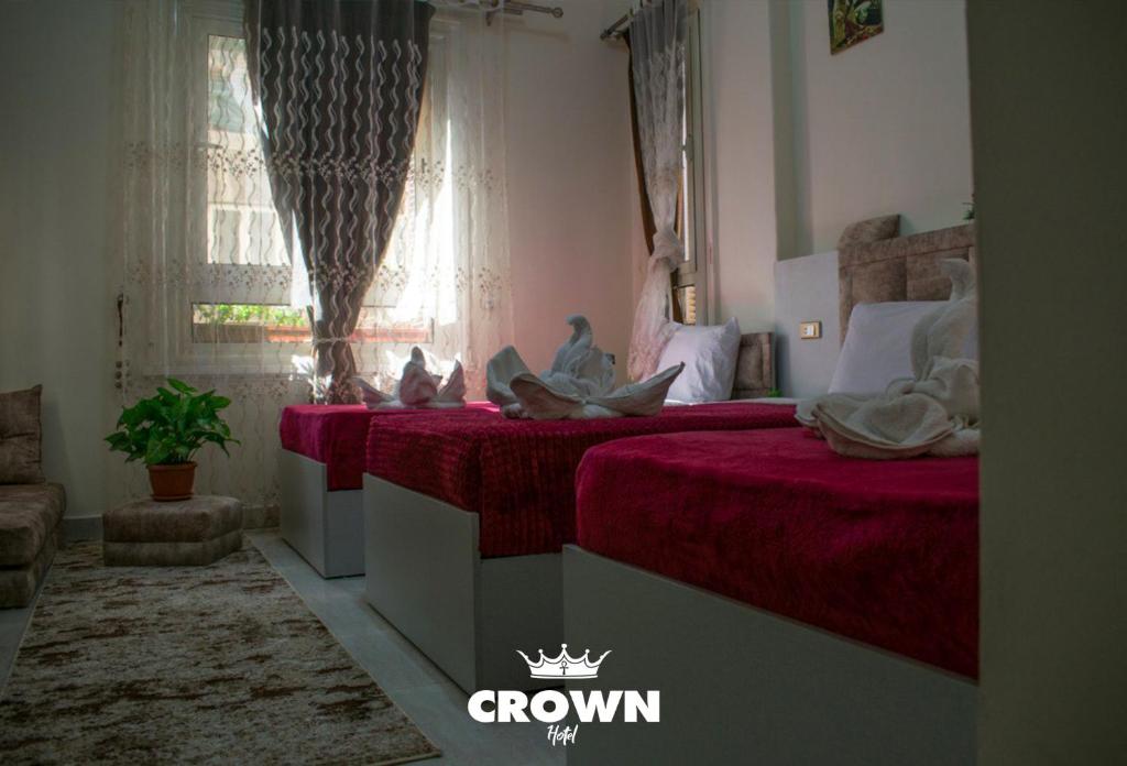 Postel nebo postele na pokoji v ubytování Crown Hotel in Cairo