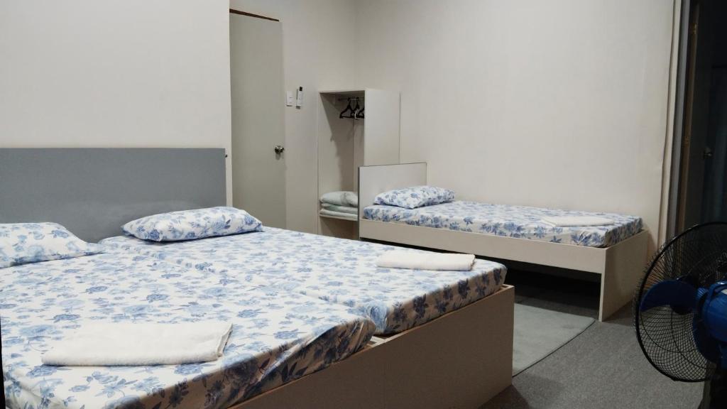 Postel nebo postele na pokoji v ubytování YES Guesthouse
