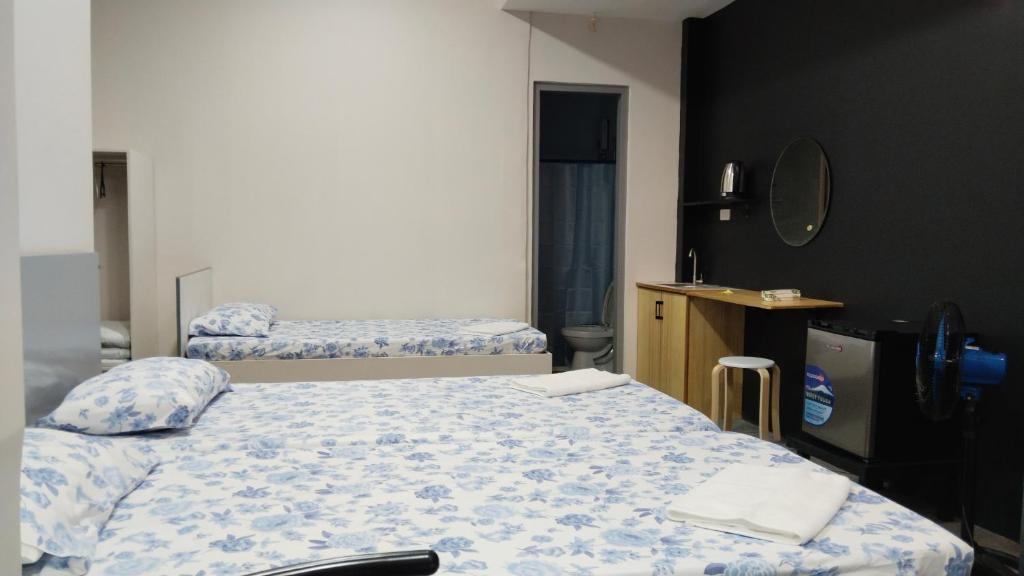 Postel nebo postele na pokoji v ubytování YES Guesthouse