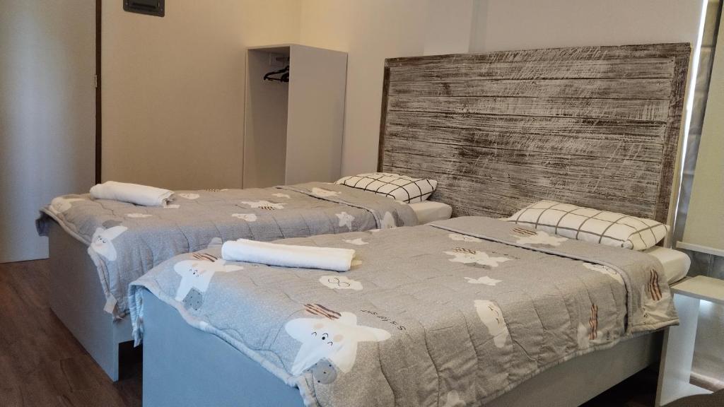 Postel nebo postele na pokoji v ubytování YES Guesthouse