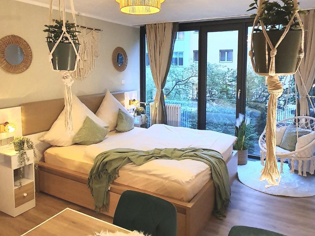 Ένα ή περισσότερα κρεβάτια σε δωμάτιο στο Bohemian Chic Sage Dreams - Munich Central Station