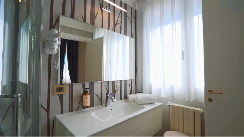 Koupelna v ubytování Hotel Sicilia