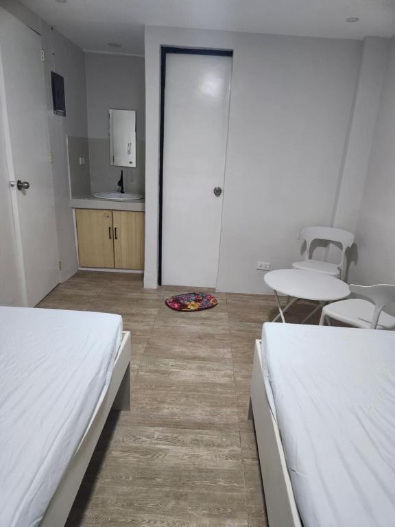 Postel nebo postele na pokoji v ubytování YES Guesthouse