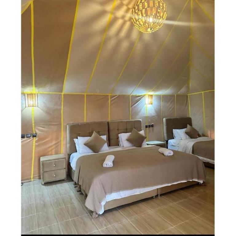 Postel nebo postele na pokoji v ubytování Traveling Luxury Camp