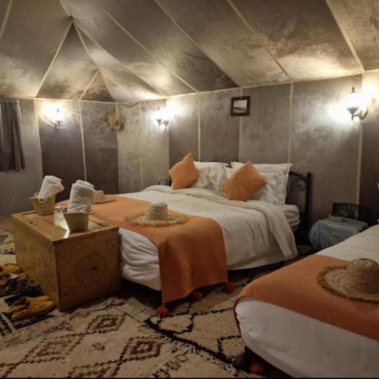 Postel nebo postele na pokoji v ubytování Traveling Luxury Camp