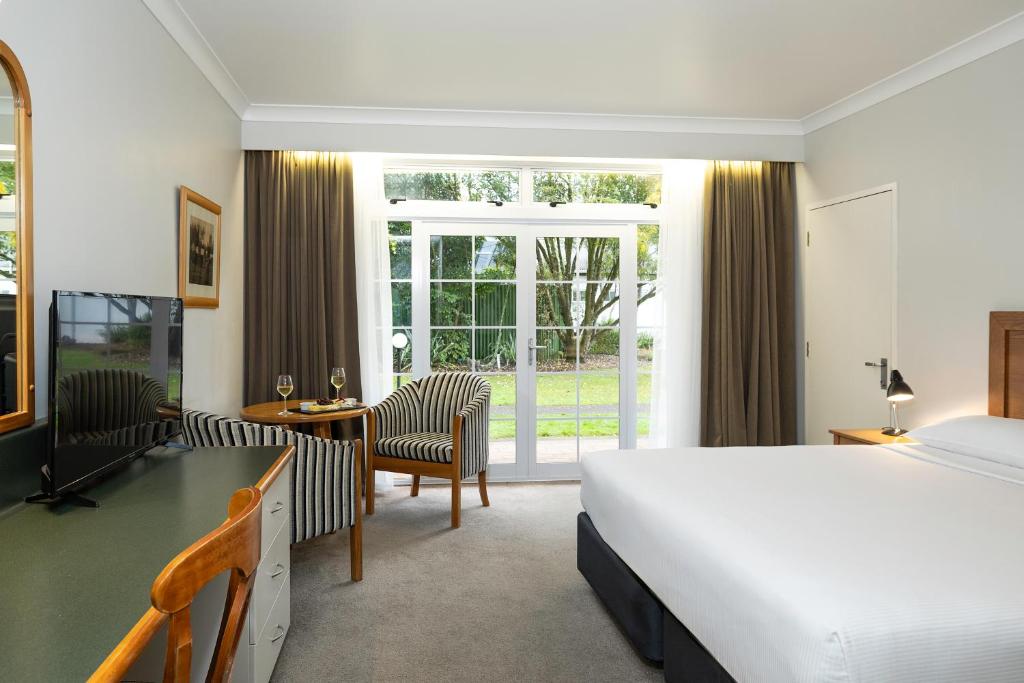 Postel nebo postele na pokoji v ubytování Wairakei Resort Taupo