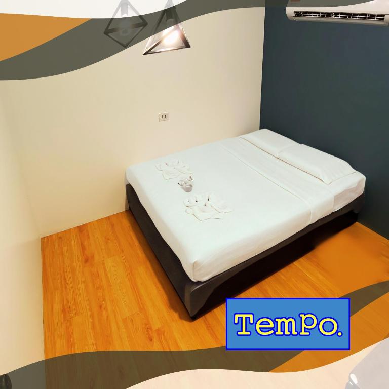 Postel nebo postele na pokoji v ubytování TEMPO
