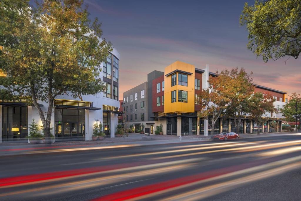 a rendering of a city street with buildings at Verve Mountain View in Mountain View