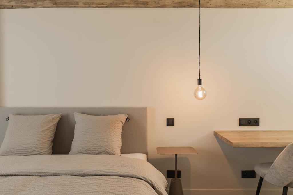 Postel nebo postele na pokoji v ubytování Hoeve De Hemel