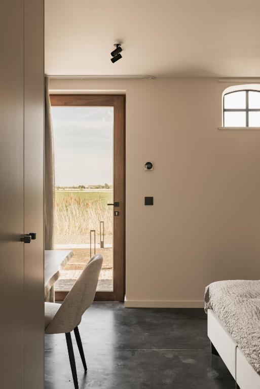 Postel nebo postele na pokoji v ubytování Hoeve De Hemel